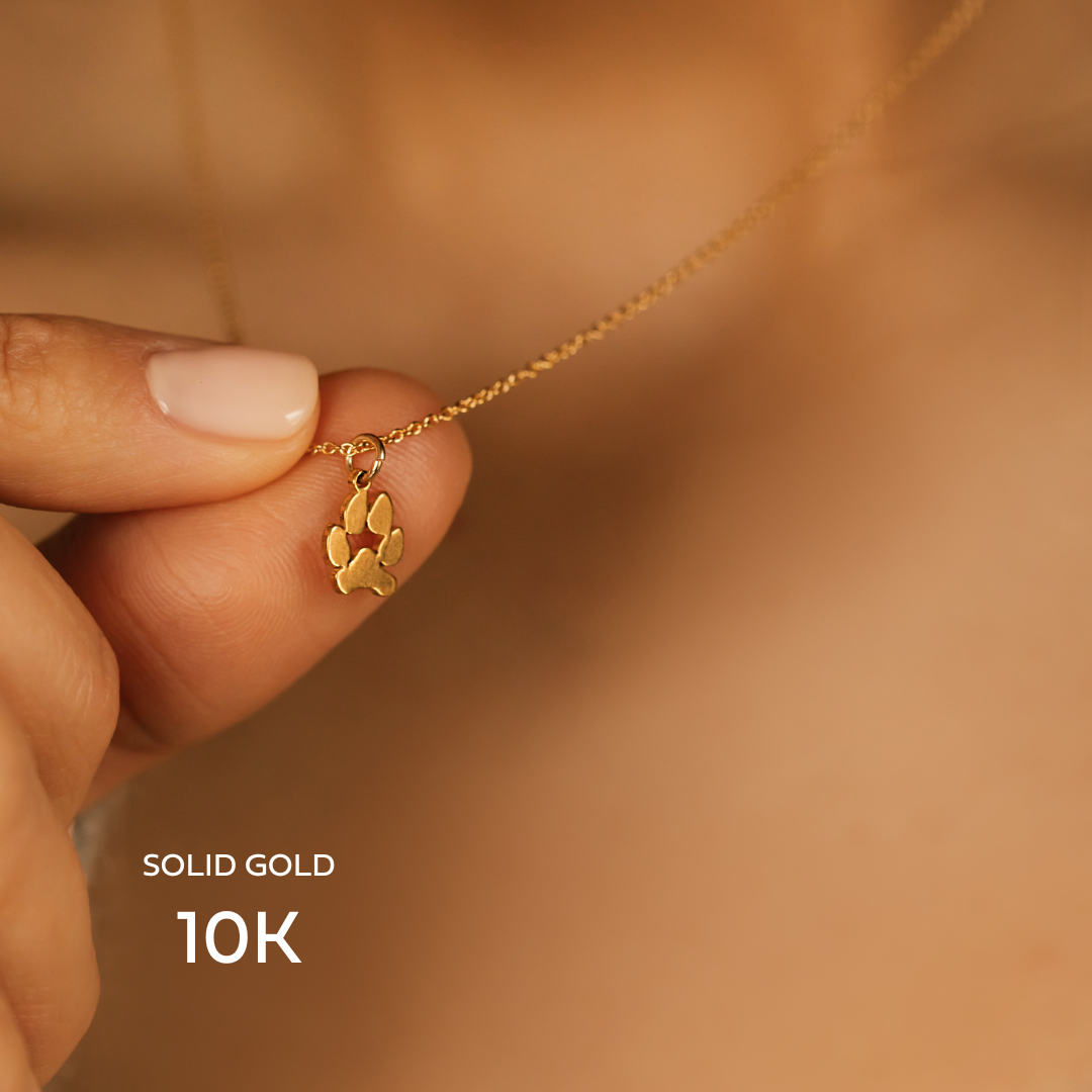 Dog paw gold pendant discount