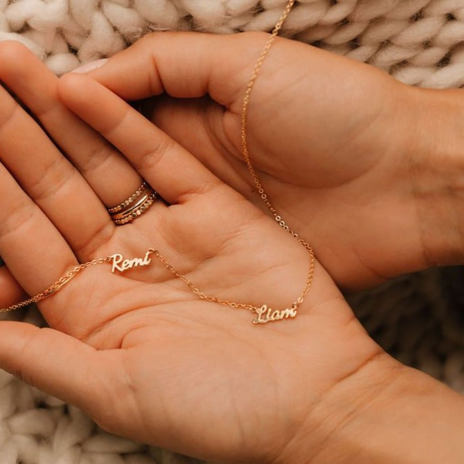 multiple name necklace in dancing script font