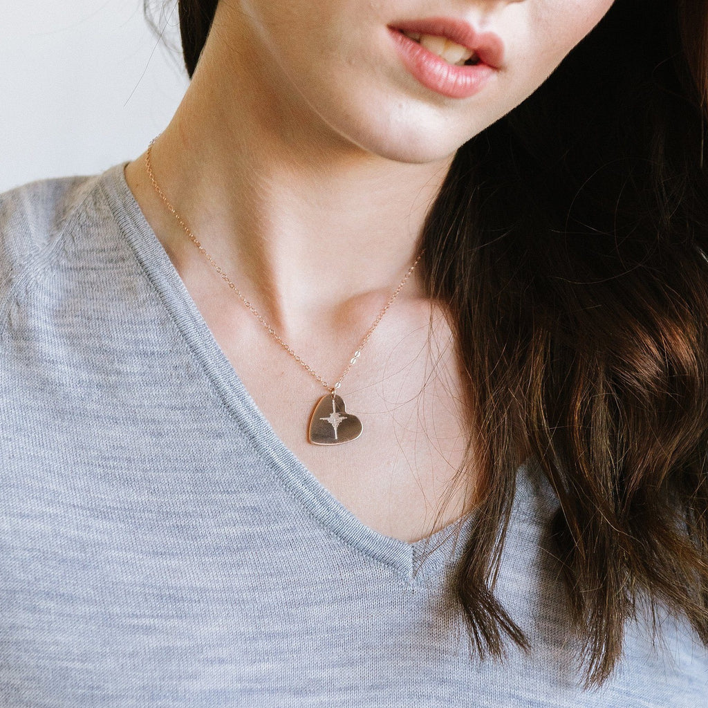 Woman wearing custom sound wave necklace made in Canada 