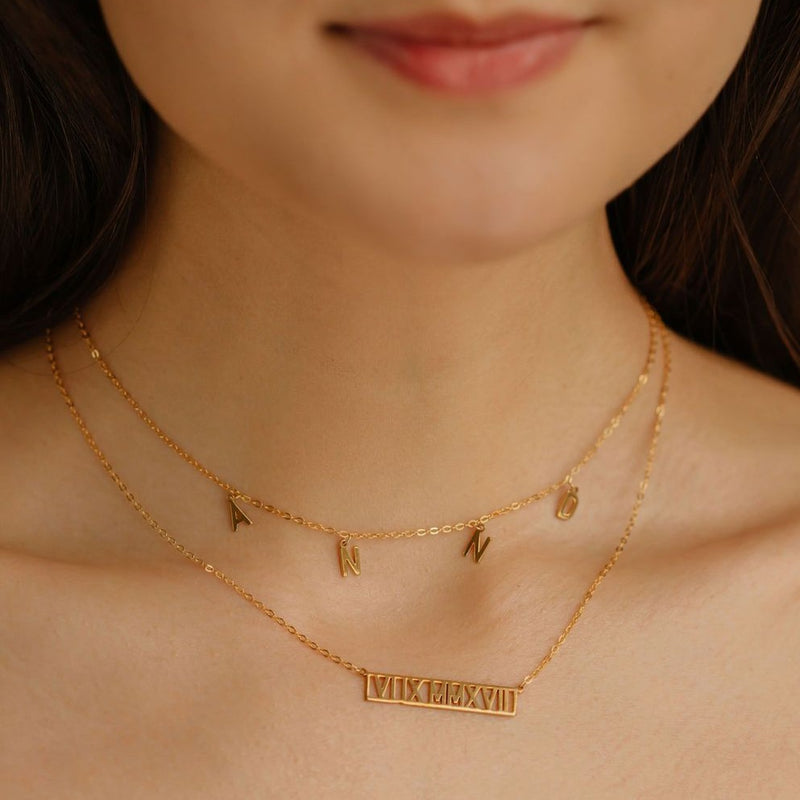 Roman Numeral Cut Out Bar Necklace Layered with Custom Dangle Letter Necklace