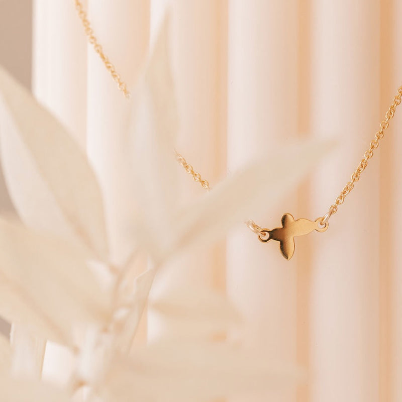 a butterfly necklace made in Canada