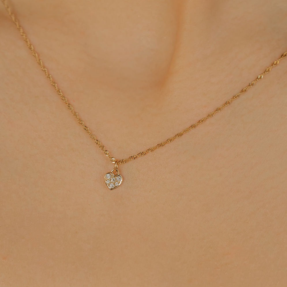  A gold diamond pave heart pendant necklace made in Canada