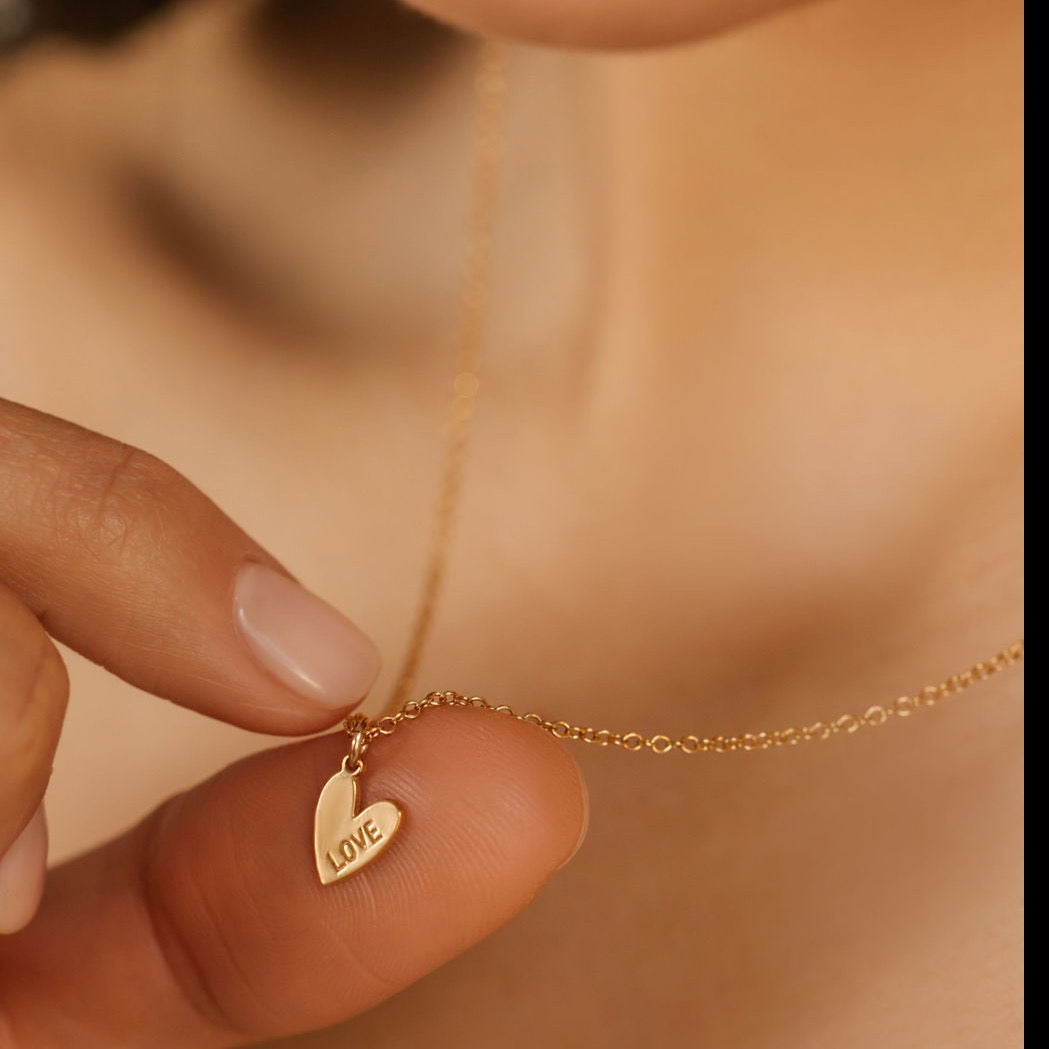 a gold love Engravable heart pendant necklace made in Canada and USA