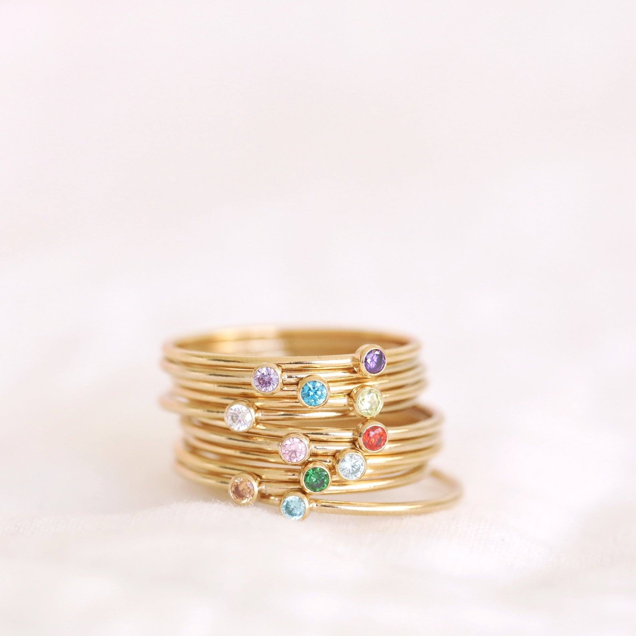 Handmade sterling silver and gold gilled birthstone rings sustainably made in Canada