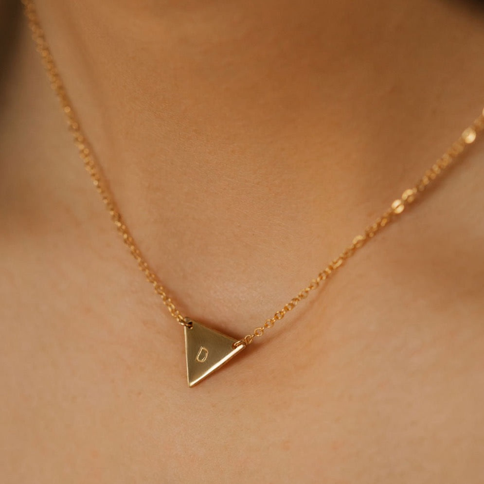 a gold filled geometric initial necklace made in Canada