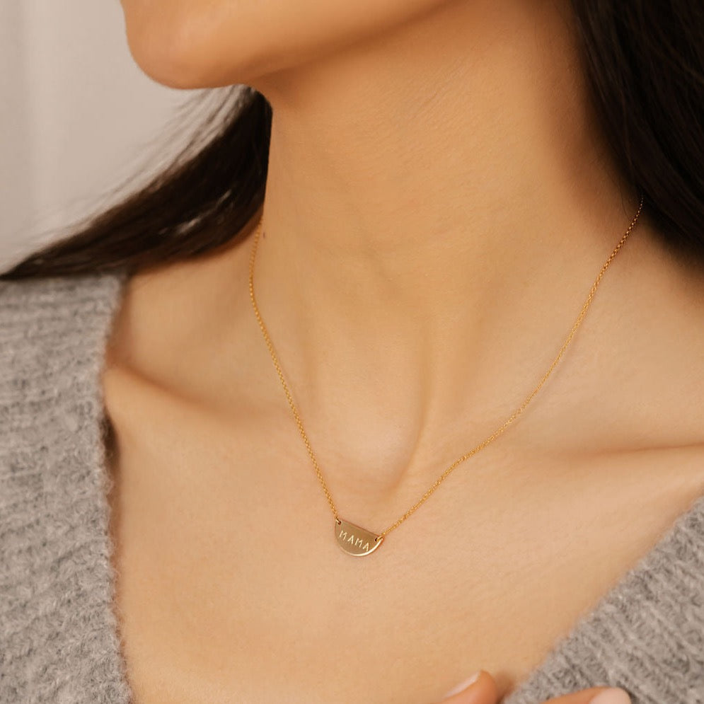 a gold mama half moon disc necklace made in Canada