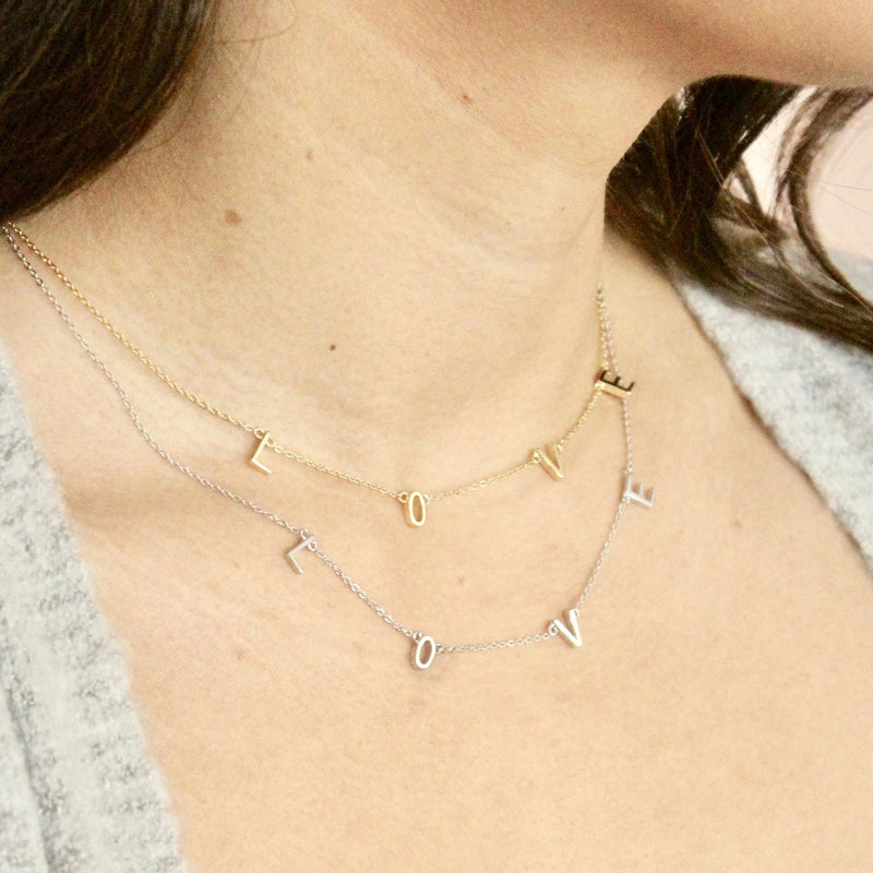 necklaces that say love in sterling silver and gold handmade in Canada
