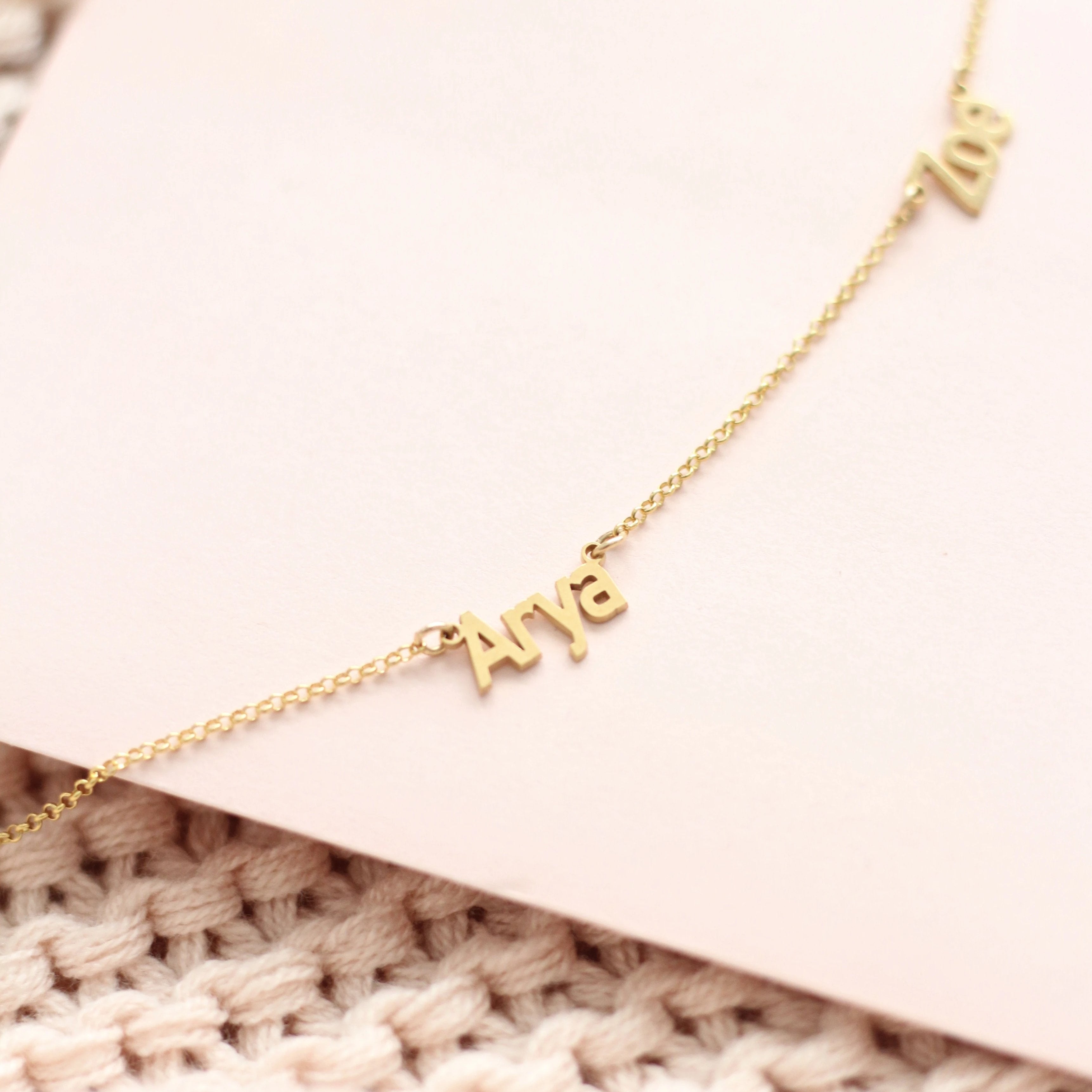 multiple name necklace in arial basic font