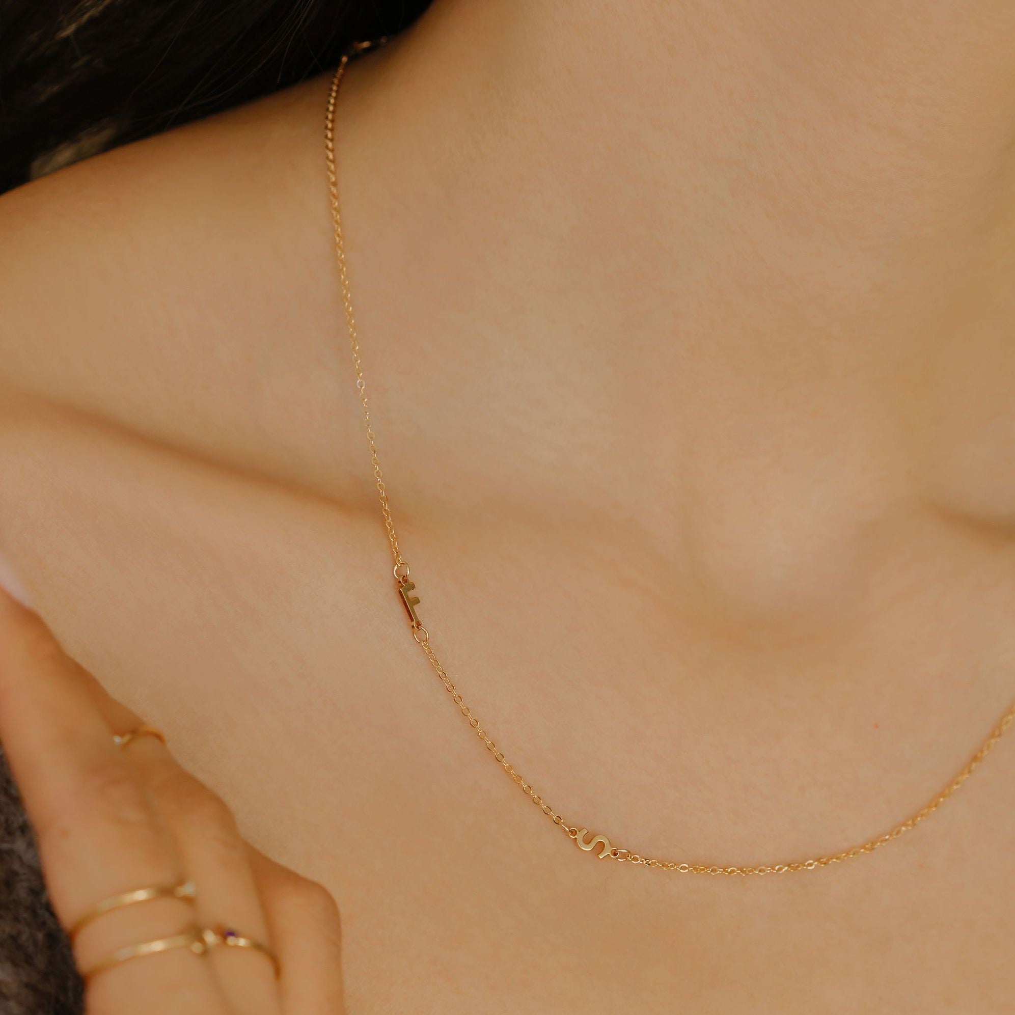Dainty sideways initial necklace in Yellow Gold, Rose Gold or White Gold.